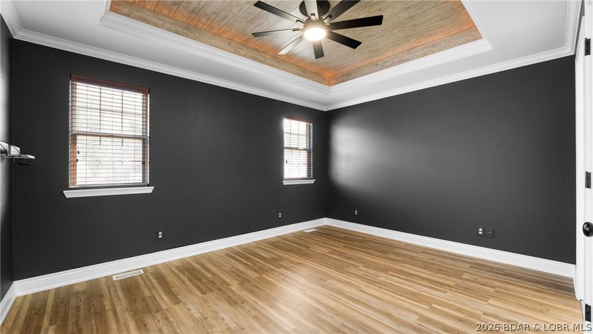 Experience lake living at its best in this beautifully updated - photo 10