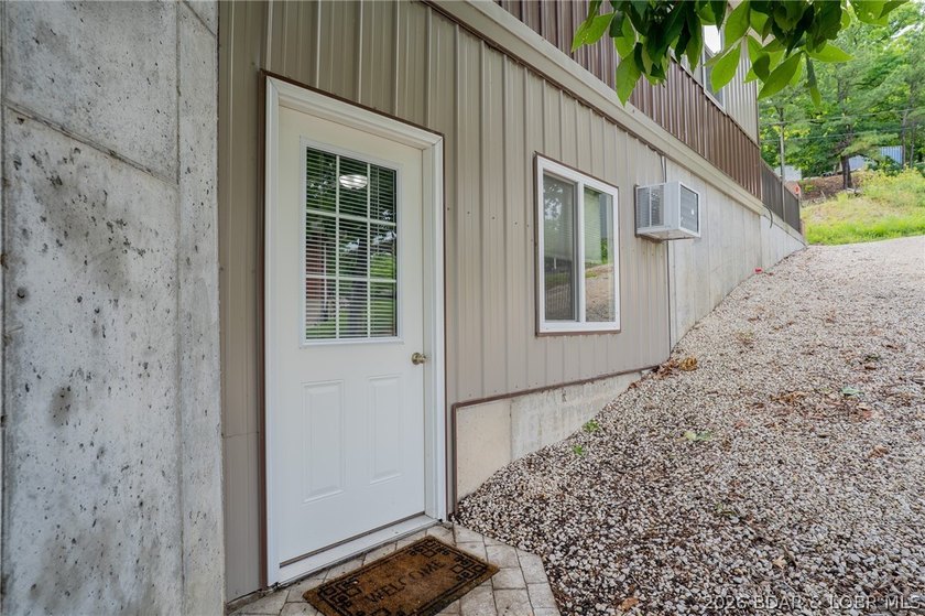 Rare opportunity to own a true Lake of the Ozarks waterfront - photo 9