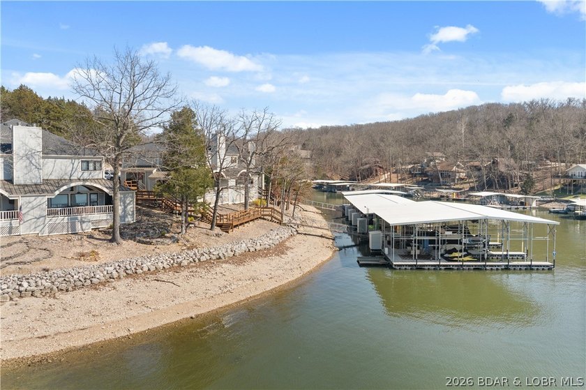 Experience tranquil lakeside living in this luxurious 3BR/3BA - photo 2