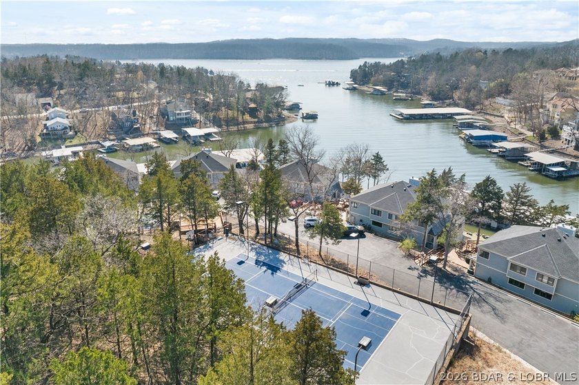 Experience tranquil lakeside living in this luxurious 3BR/3BA - photo 3