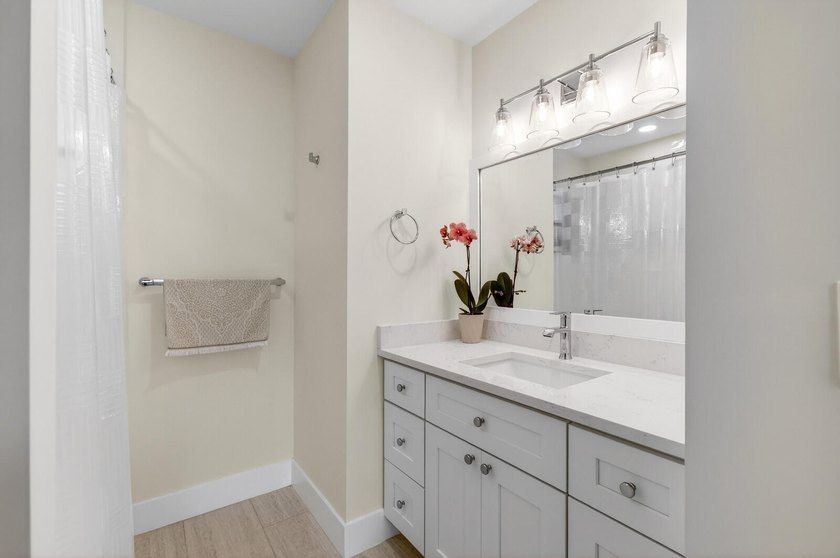 Experience modern luxury in this impeccably renovated corner - photo 39