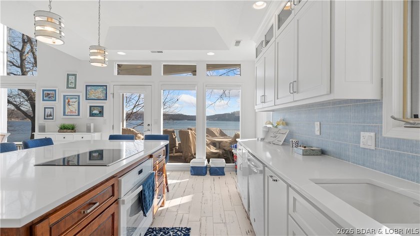 Experience the ultimate Lake of the Ozarks lifestyle in this - photo 7