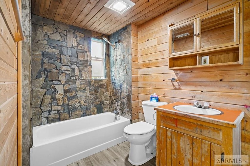 This newly remodeled home is one of a kind, blending rustic - photo 9