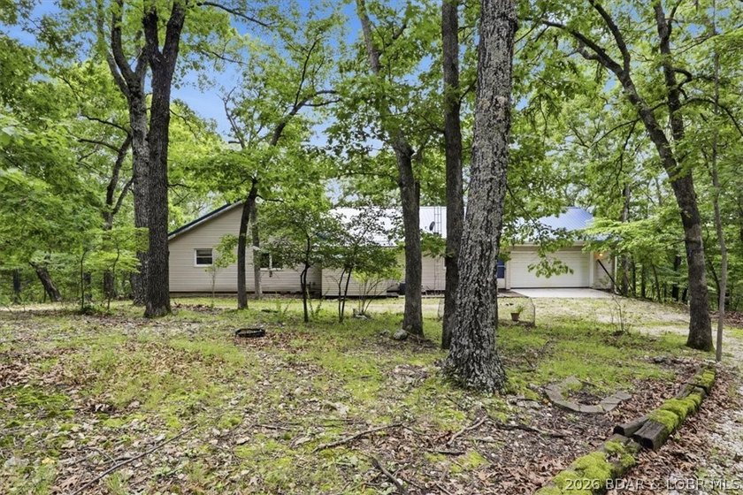 Discover the perfect blend of privacy, space, and lake living on - photo 2