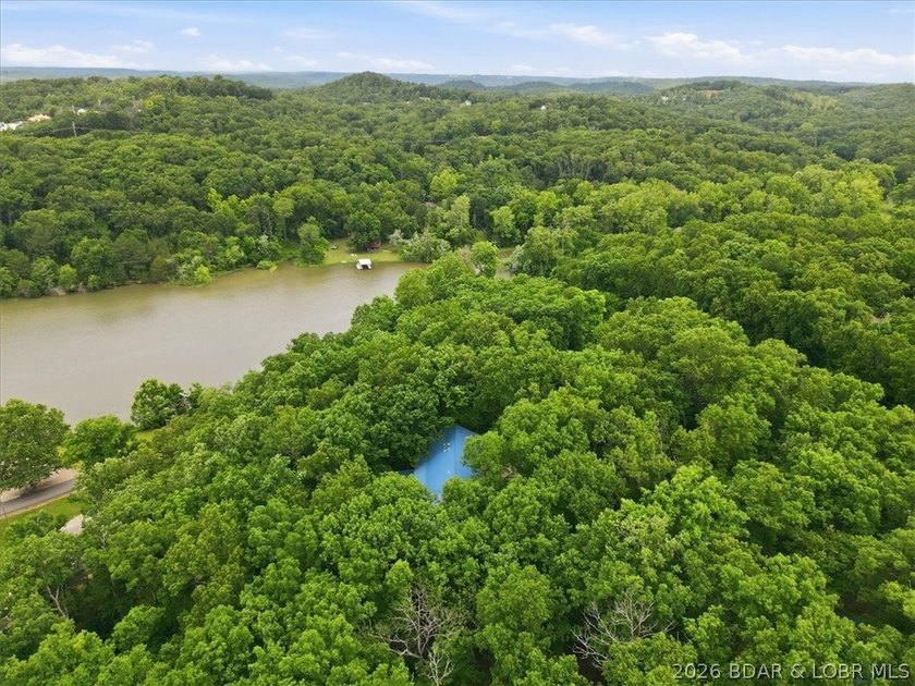 Discover the perfect blend of privacy, space, and lake living on - photo 7