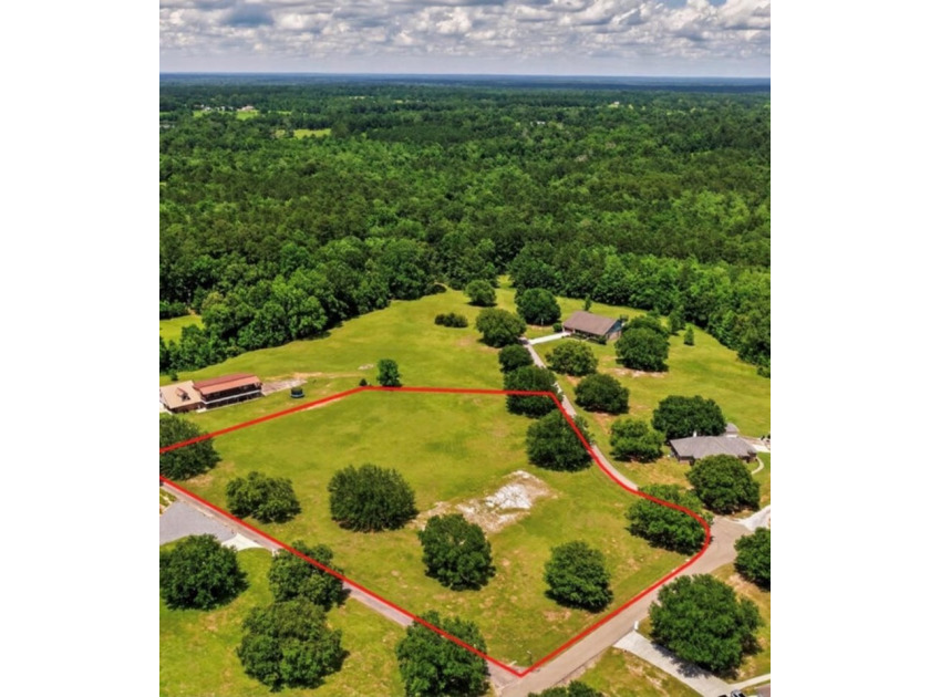 Beautiful 3.10-acre corner lot located at the corner of Shavon - photo 2
