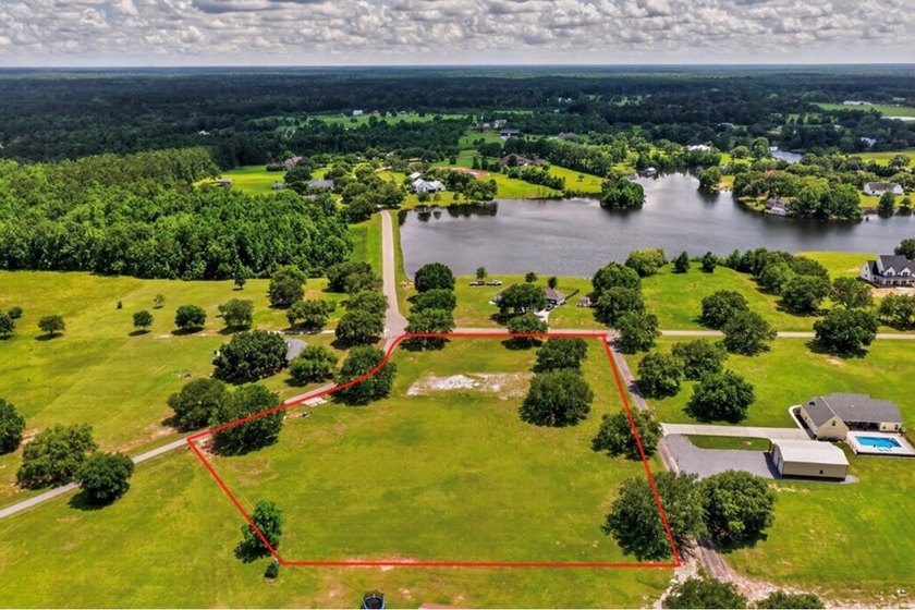 Beautiful 3.10-acre corner lot located at the corner of Shavon - photo 9