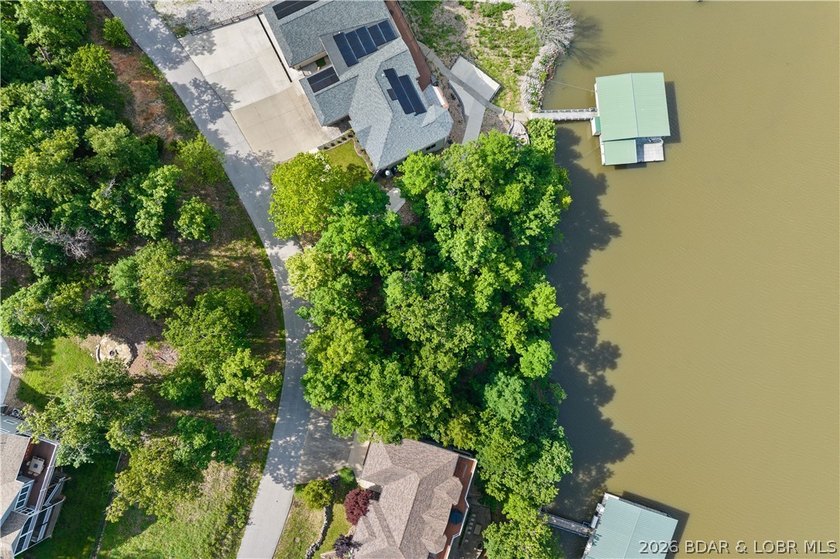 Discover this premier lakefront lot in the highly sought-after - photo 4