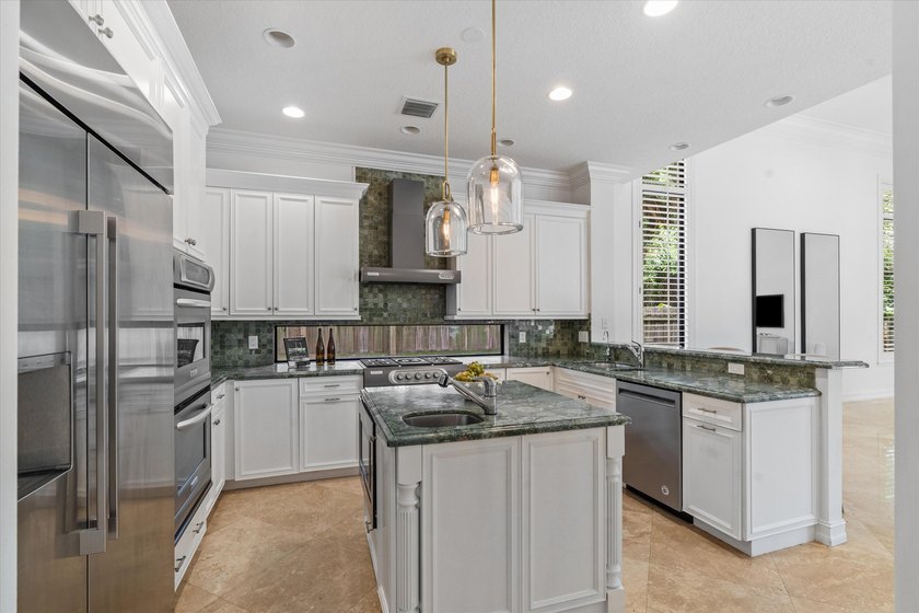 Situated on an oversized lot at the end of a quiet, tree-lined - photo 17