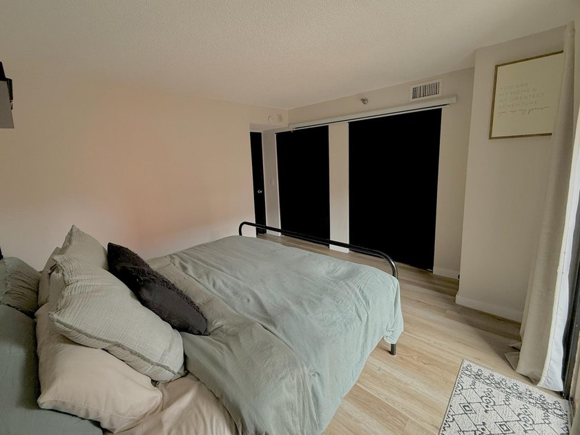 This bright and generously sized corner unit offers an open - photo 7