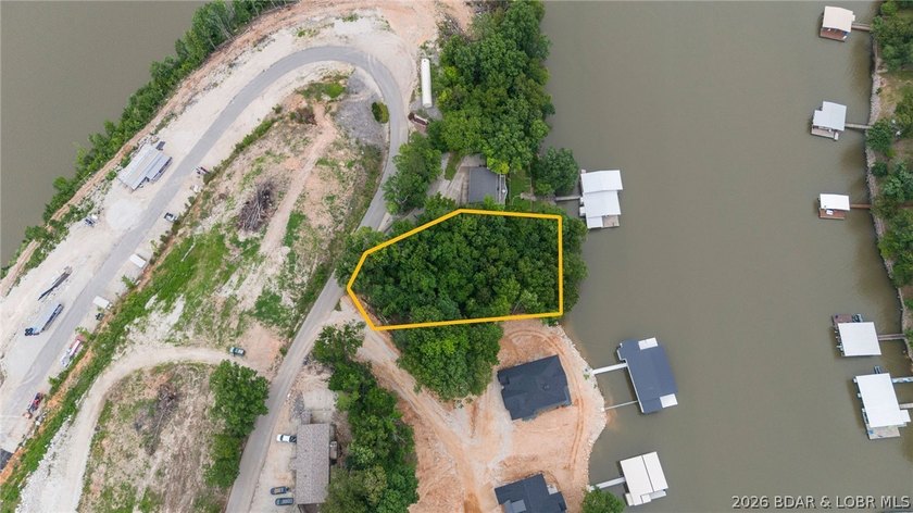 Build the luxury lakefront home of your dreams in this exciting - photo 2