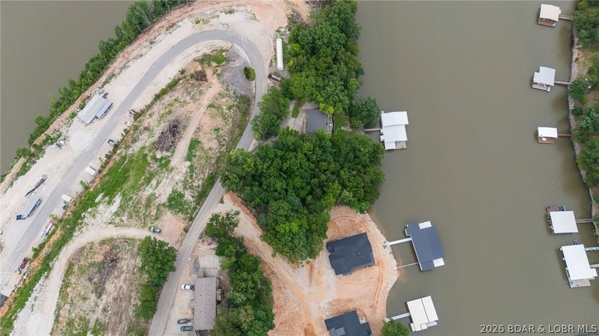 Build the luxury lakefront home of your dreams in this exciting - photo 3