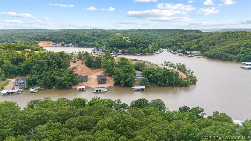 Build the luxury lakefront home of your dreams in this exciting - photo 5