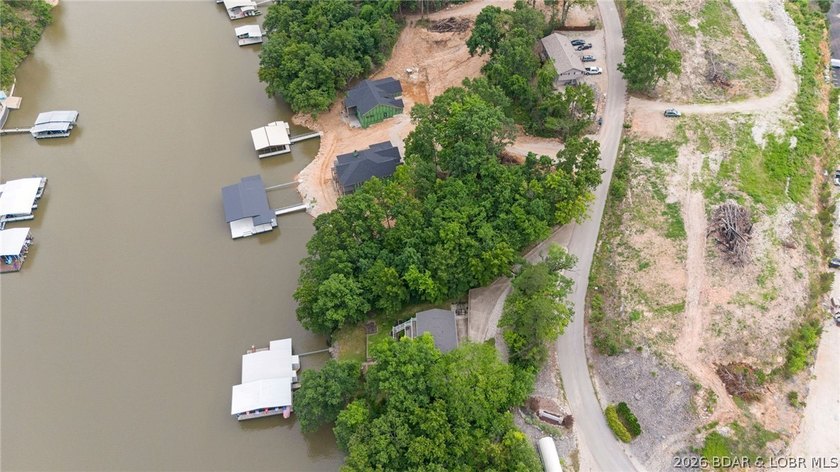Build the luxury lakefront home of your dreams in this exciting - photo 8