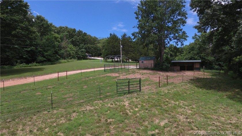 Beautiful 30 +/- acre property just minutes from Lake Ozark! The - photo 4