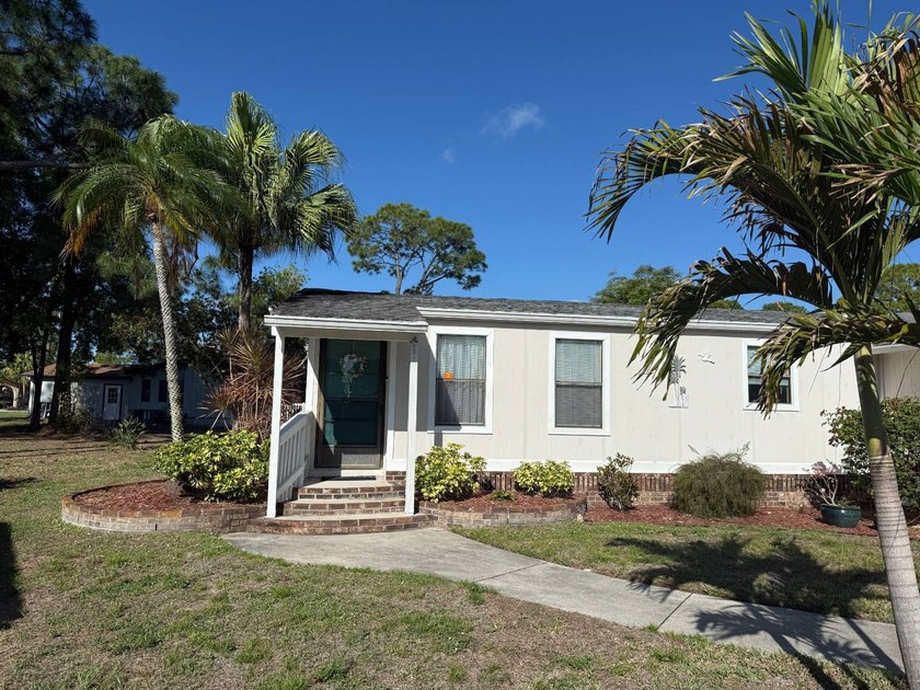 This well cared for home is located on an interior lot and is - photo 2