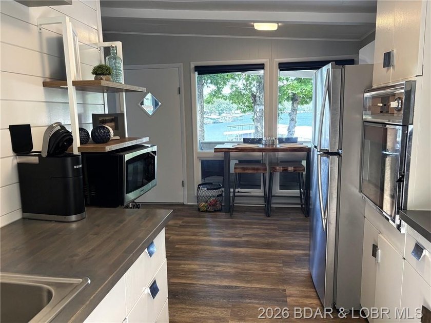Sitting on a gentle lot in a beautiful cove location, this gem - photo 5