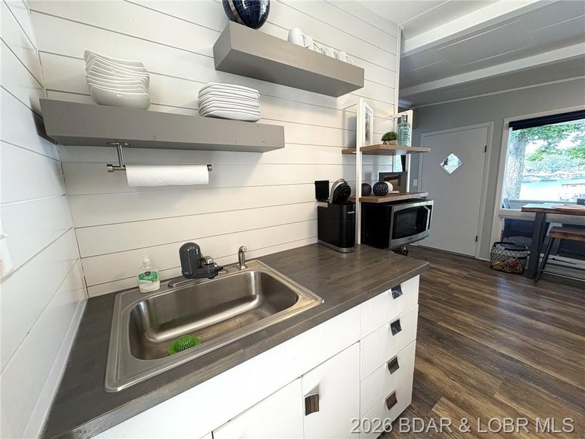Sitting on a gentle lot in a beautiful cove location, this gem - photo 6