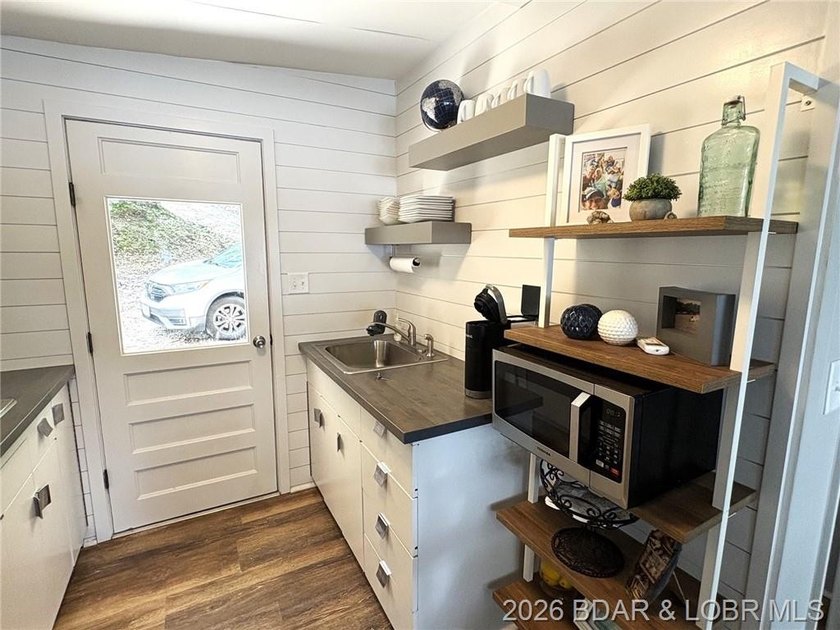 Sitting on a gentle lot in a beautiful cove location, this gem - photo 8