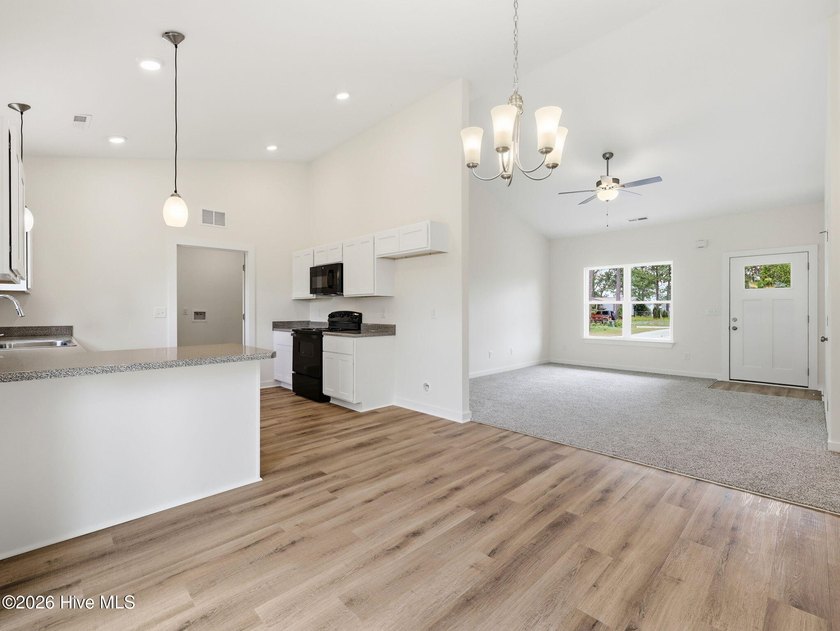 Welcome to a fresh start in a neighborhood on the rise with the - photo 11