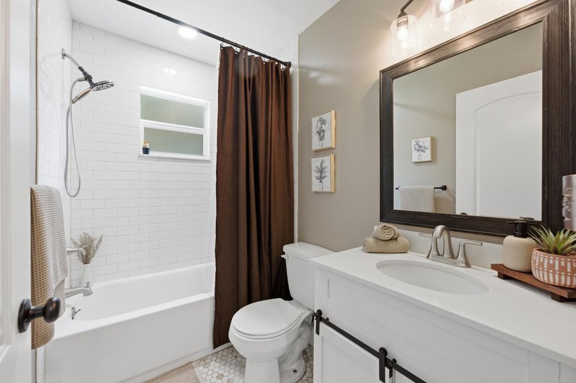 Welcome to this beautifully renovated 3-bedroom, 2-bath home in - photo 23