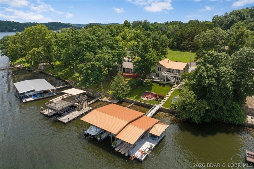 The ultimate Lake of the Ozarks retreat awaits at this premier - photo 2