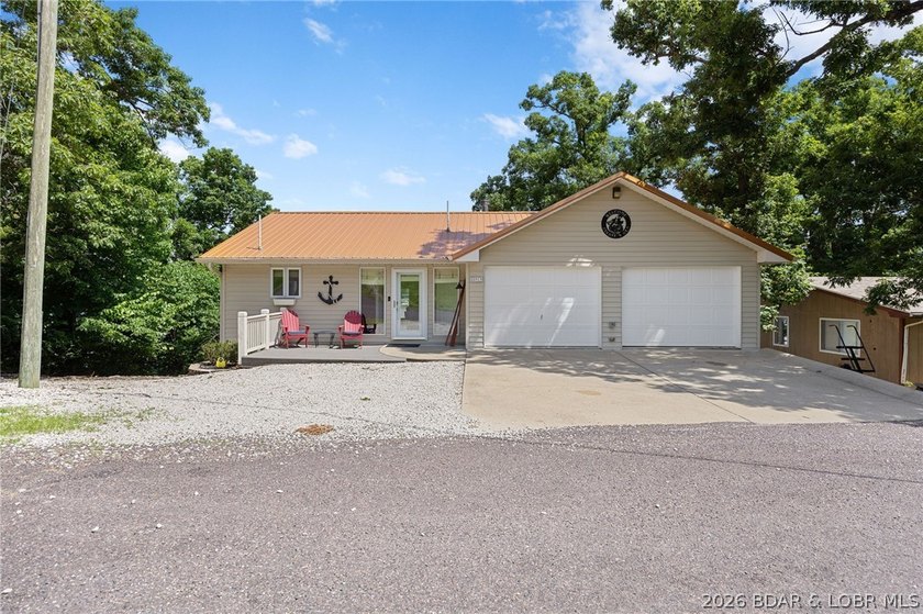 The ultimate Lake of the Ozarks retreat awaits at this premier - photo 3