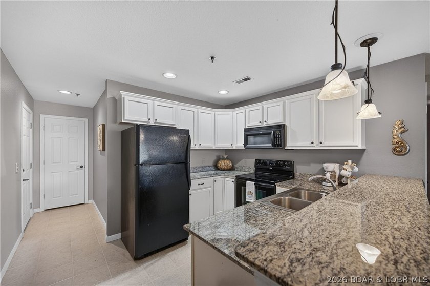 You're in luck just listed 3 bedroom 2 bath walk-in end unit is - photo 5