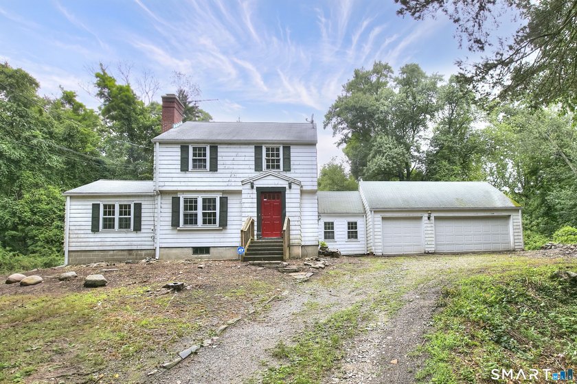 Nestled on approximately 1.1 acres in Southport, this classic - photo 2