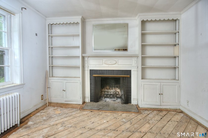 Nestled on approximately 1.1 acres in Southport, this classic - photo 3