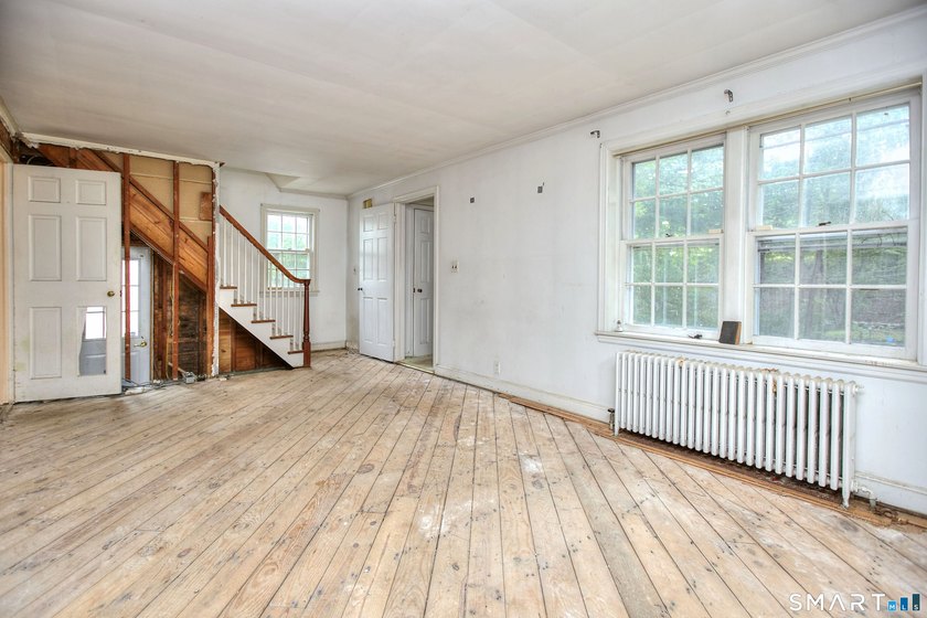 Nestled on approximately 1.1 acres in Southport, this classic - photo 5