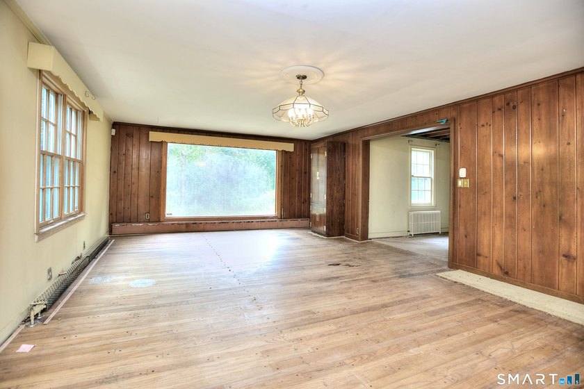 Nestled on approximately 1.1 acres in Southport, this classic - photo 9