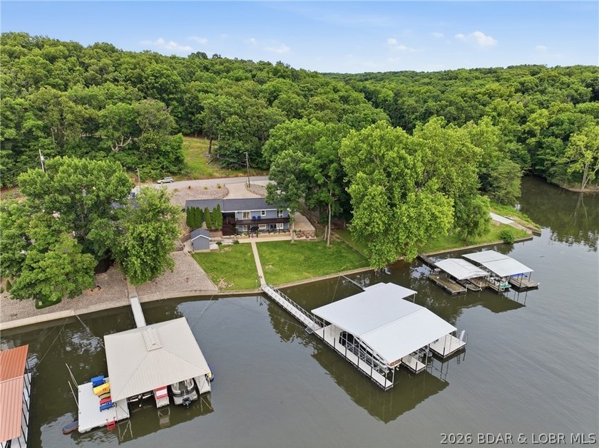 Lake life doesn't get much better than this! Nestled in one of - photo 2