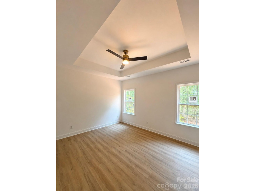 Escape to the lake in this stunning, newly constructed 3-bedroom - photo 6