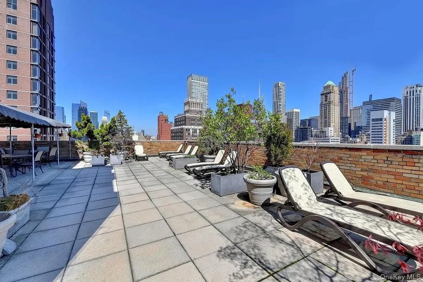 This tastefully renovated studio sits high on the 17th floor of - photo 12