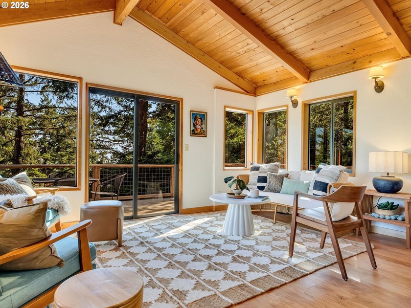 Escape to this treehouse-like retreat tucked safely high on a - photo 9