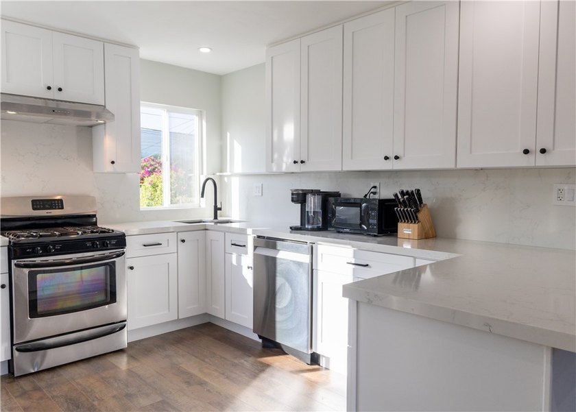 Welcome to this beautifully refreshed home located in the - photo 4