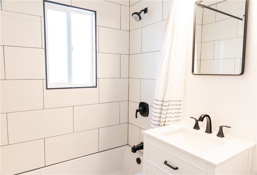 Welcome to this beautifully refreshed home located in the - photo 8