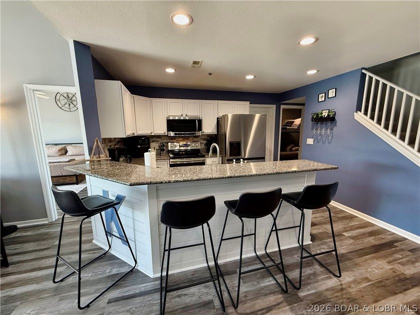 Lake life just got a serious glow-up! This beautifully remodeled - photo 9