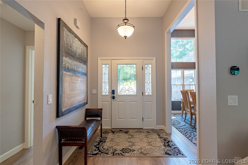 Located on a quiet cul-de-sac w/seasonal lake view in the highly - photo 3