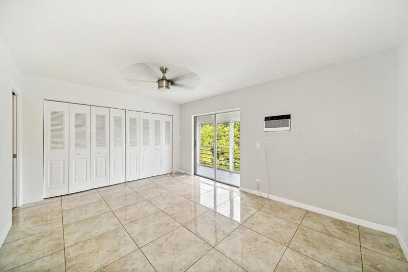 Welcome to this updated 1-bedroom, 1.5-bathroom condo is - photo 12