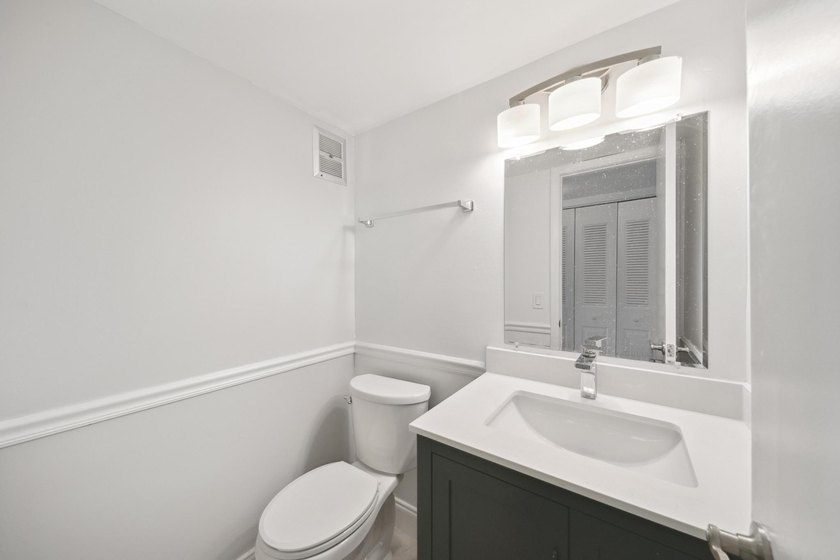 Welcome to this updated 1-bedroom, 1.5-bathroom condo is - photo 13