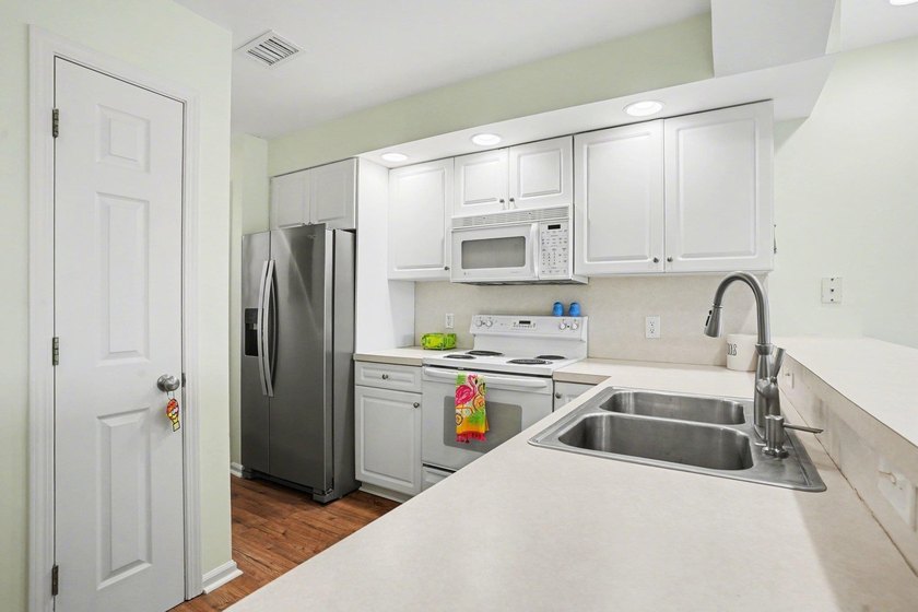 A much sought after 1st floor, corner unit with Intracoastal - photo 13