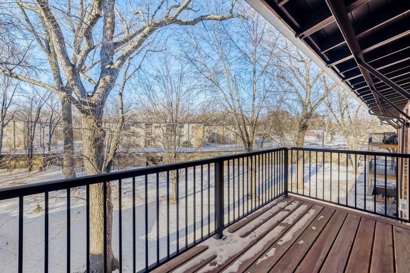 Move right into this top-floor, one-level home offering - photo 7