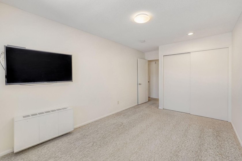 Move right into this top-floor, one-level home offering - photo 10
