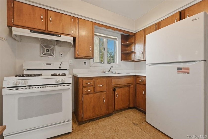 Spacious split-level home set on a huge, private wooded property - photo 9