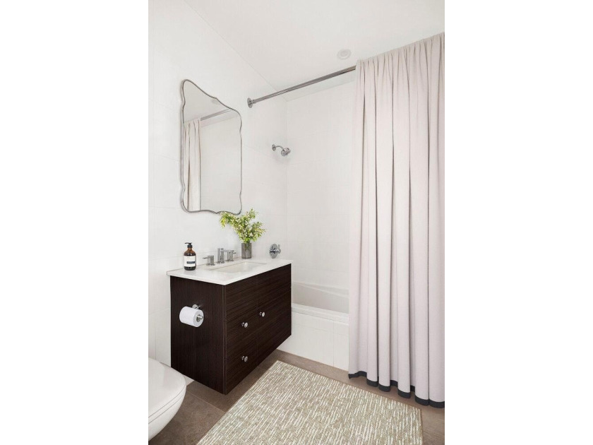 Residence 3B at 84 Oak Street is a design-forward home defined - photo 10