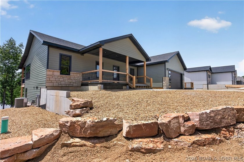 Stunning new-construction waterfront home at the Lake of the - photo 7