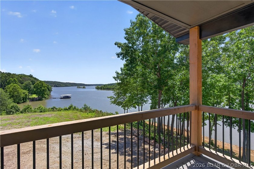 Stunning new-construction waterfront home at the Lake of the - photo 10