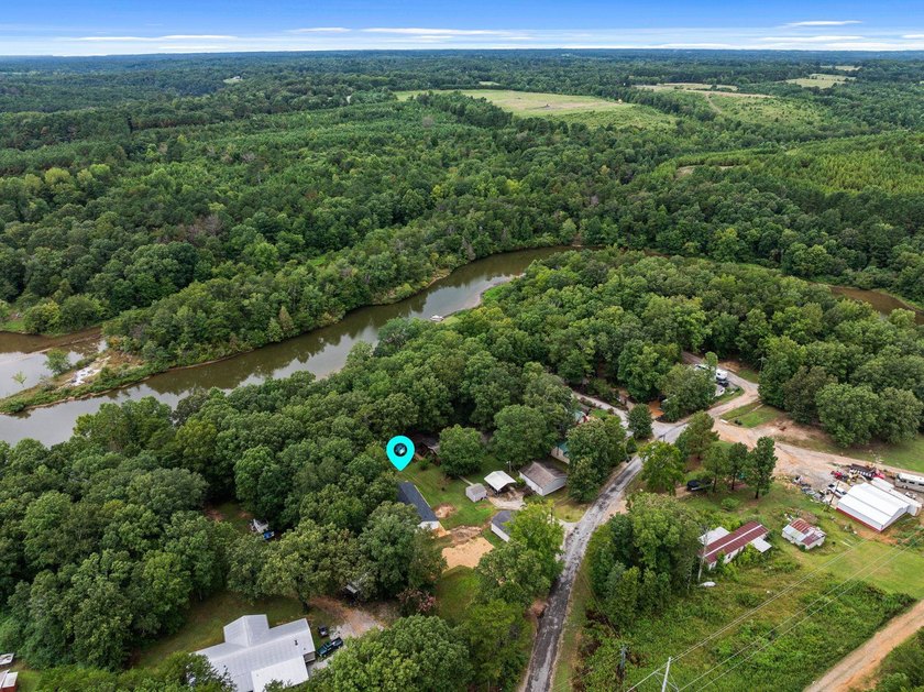 One of a kind mobile home sitting on Bear Creek, with navigable - photo 34